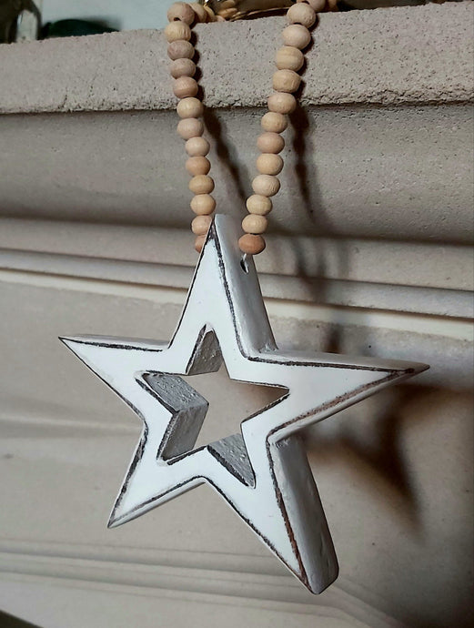 Star with wooden bead hoop